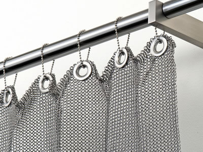 Chainmail curtain installs on stainless steel rod linked with rings.