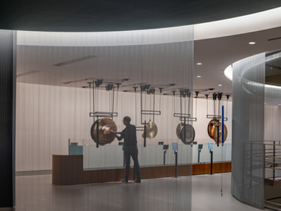 Metal Coil Drapery used as a museum room divider