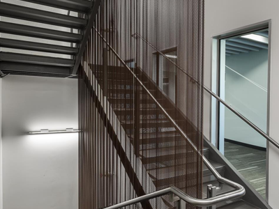 Metal coil drapery used for staircase decoration