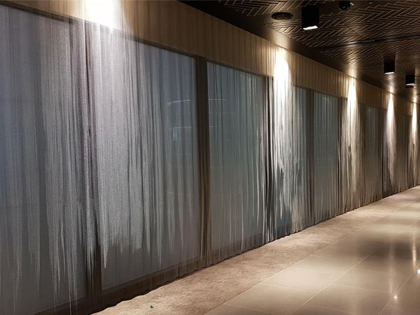 Details of metal coil drapery in Muscat international airport